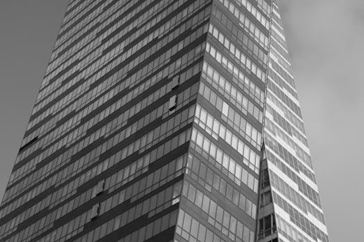 Black and white photo of a modern skyscraper in Istanbul's downtown center.